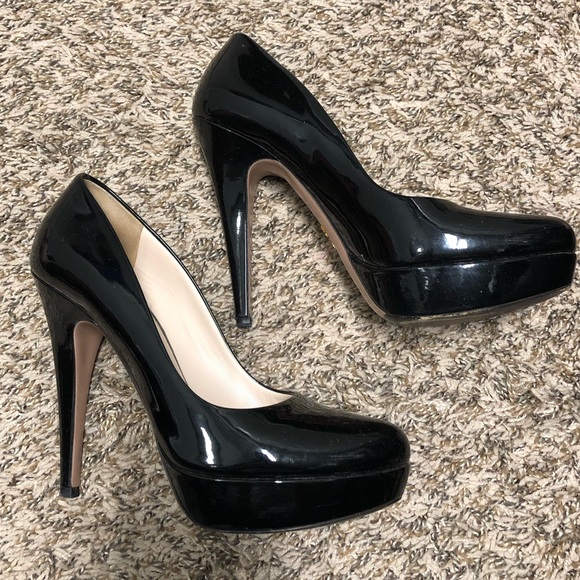 black patent leather platform pumps